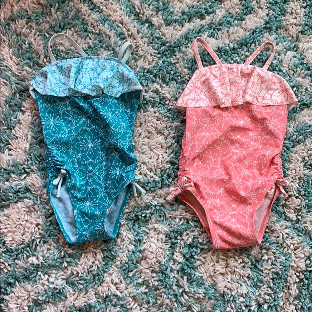 Twin girls one piece swim with side ties
